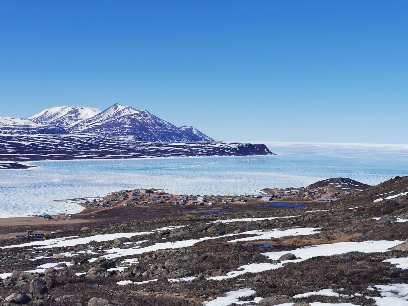 The hamlet of Qikiqtarjuaq on the frozen coast of Baffin Island